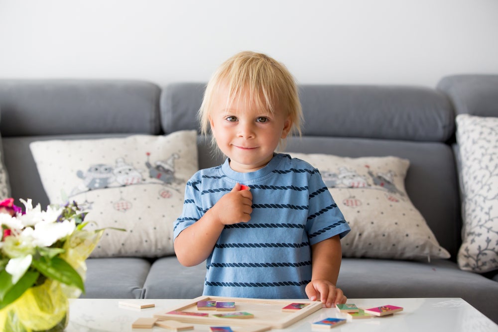 Toddler doing puzzle