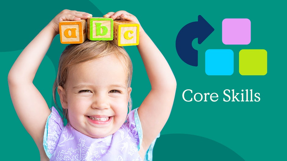 Core Skills: Toddler holding ABC blocks on her head