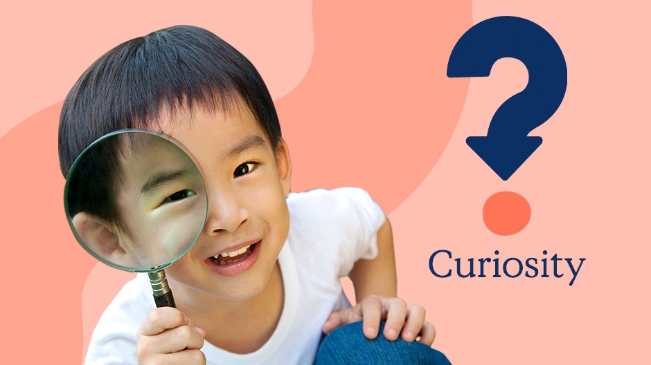 Curiosity: Child holding a magnifying glass