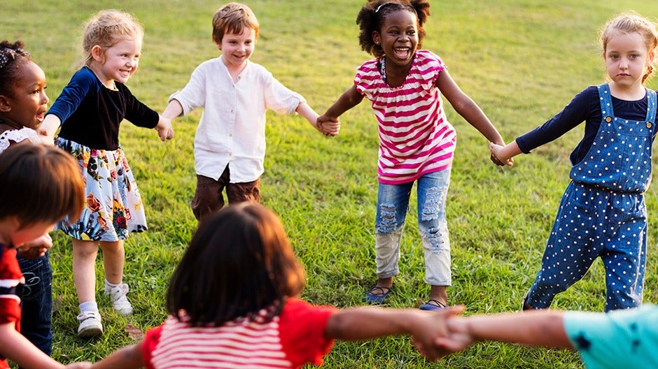 Preschoolers practicing gratitude through interactive activities