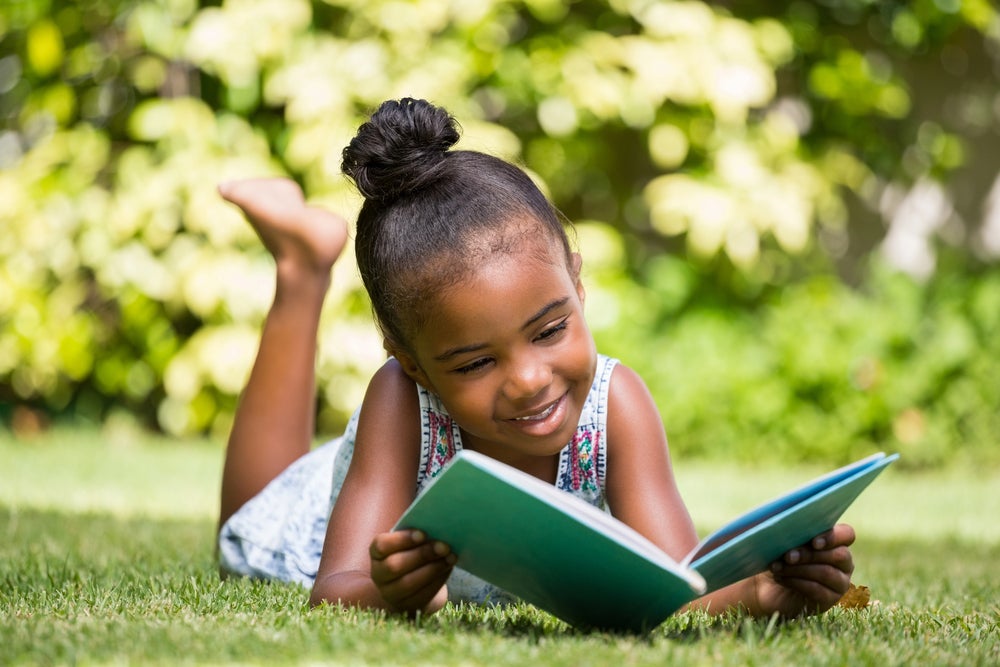 young girl independent reading

