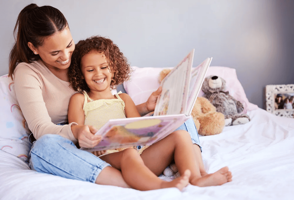 Mom reading with daughter