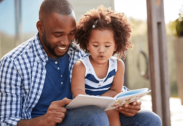 dad reading kindness quotes for kids