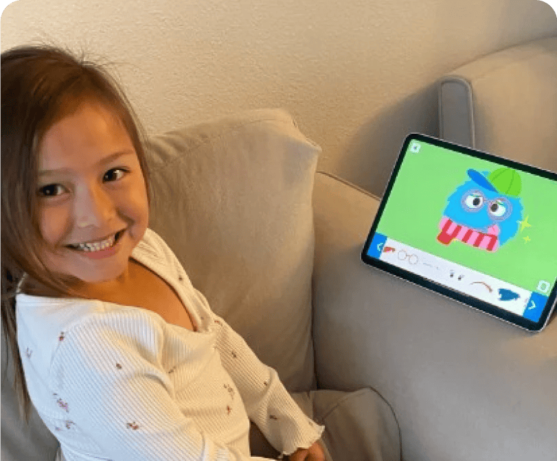 Kid watching educational videos on tablet
