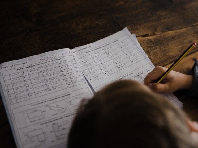 kid working on math problem