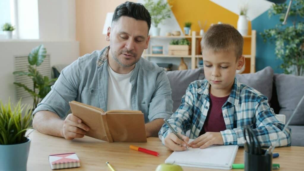Dad reading to son