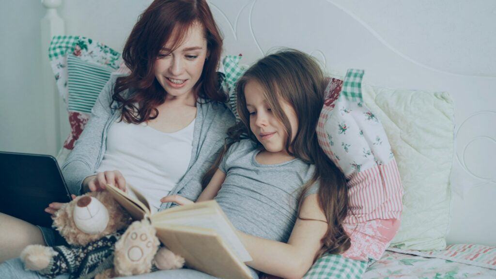 Mom reading to daughter